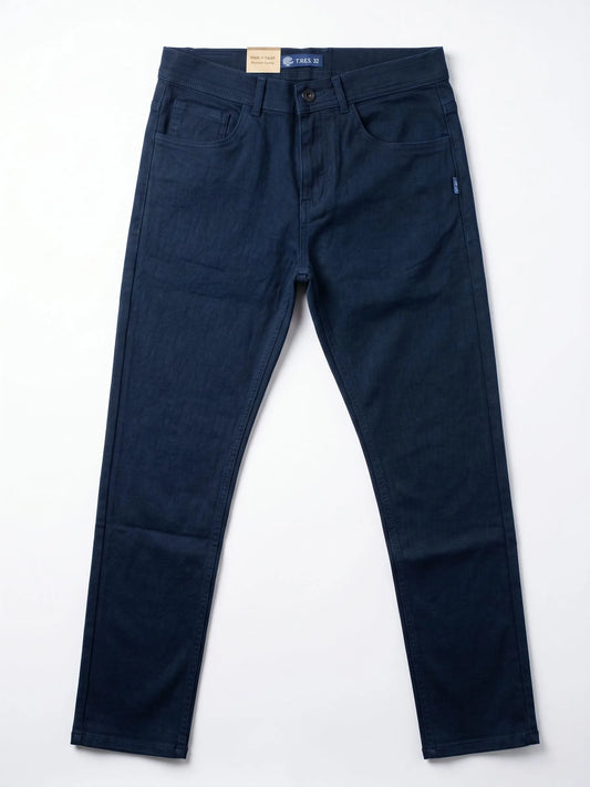 Studio shot of men's slim-fit 5-pocket gabardine pants in dark blue by TREE.