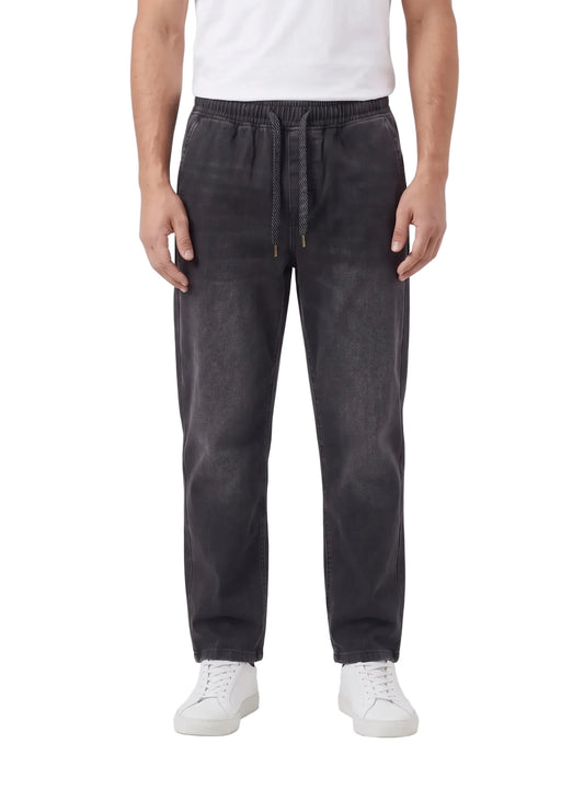 Men's black wide-leg jeans made of 99% cotton and 1% elastane with elastic waist by TREE