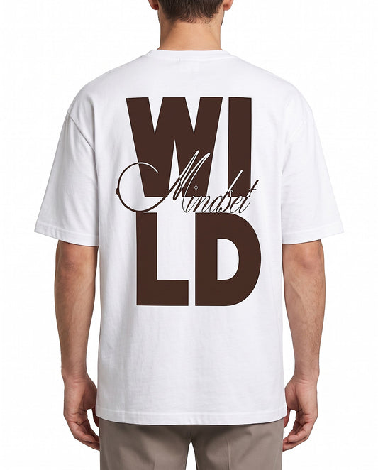 A man viewed from the back wearing a white t-shirt with a large brown graphic print reading 'WILD Ambition' on the back, paired with beige pants, against a plain white background.