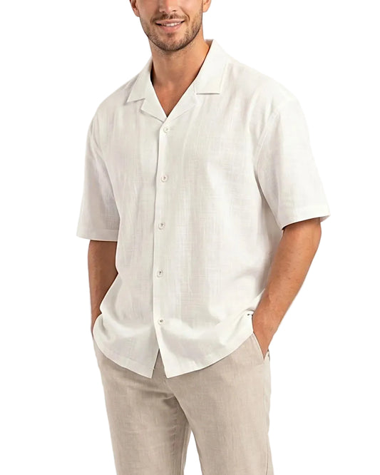 Front view of a men's solid beige casual shirt featuring a camp collar, short sleeves, and textured fabric in an oversized fit by TREE.