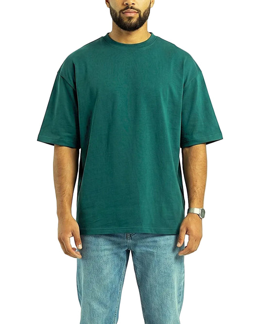 Front view of a men's dark green 100% cotton oversized t-shirt in a clean solid design by TREE.