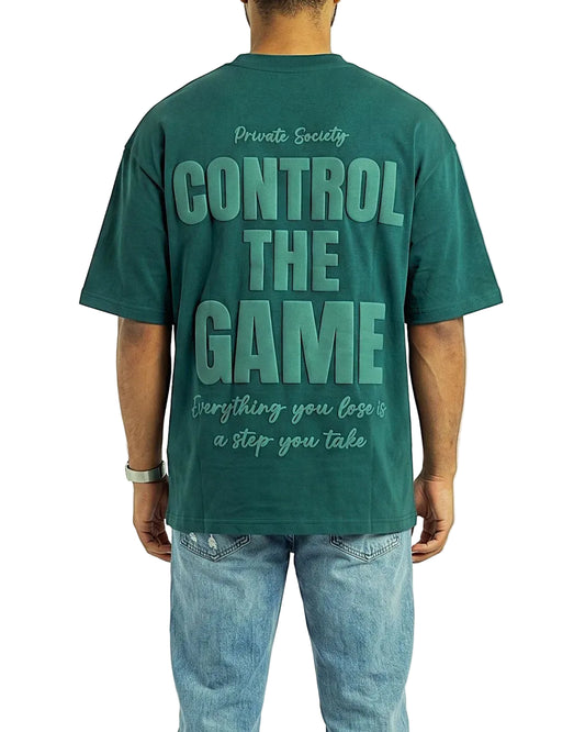 Front view of a men's dark green 100% cotton oversized t-shirt in a clean solid design by TREE.