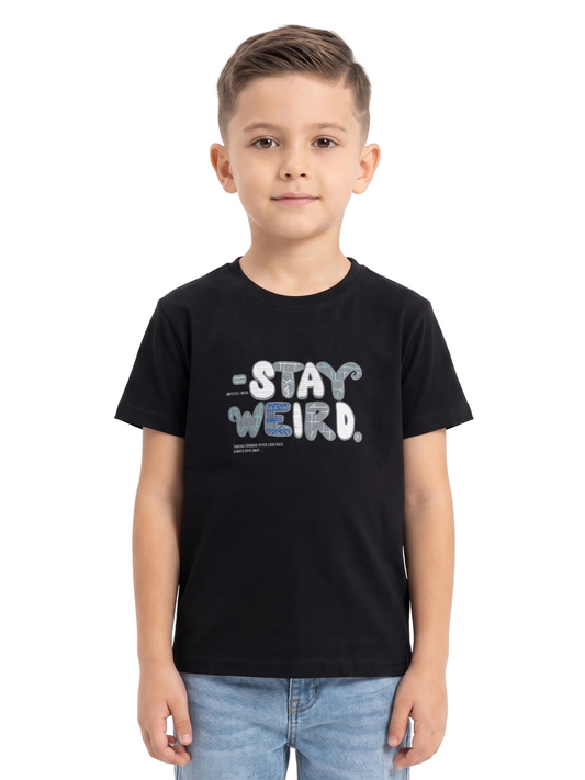 Child wearing a black t-shirt with 'Stay Weird' text on a white background