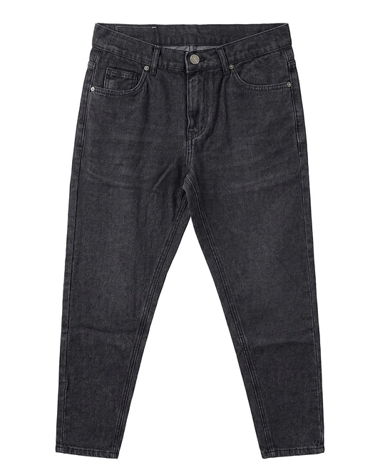 Front view of a model wearing men's boyfriend fit jeans in a classic wash by TREE.