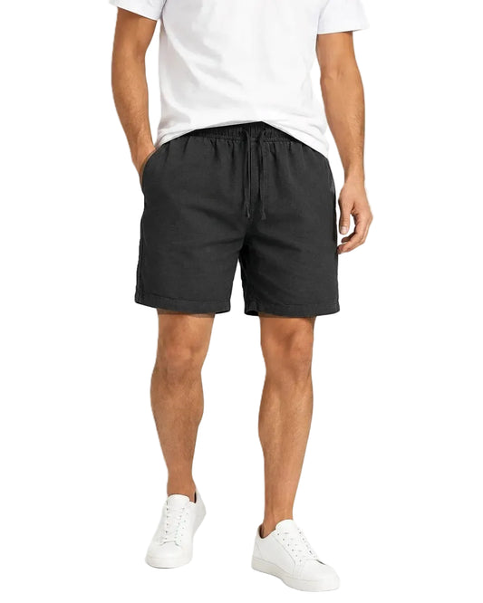 Front view of a model wearing men's cotton-linen summer shorts with an elastic waist by TREE.