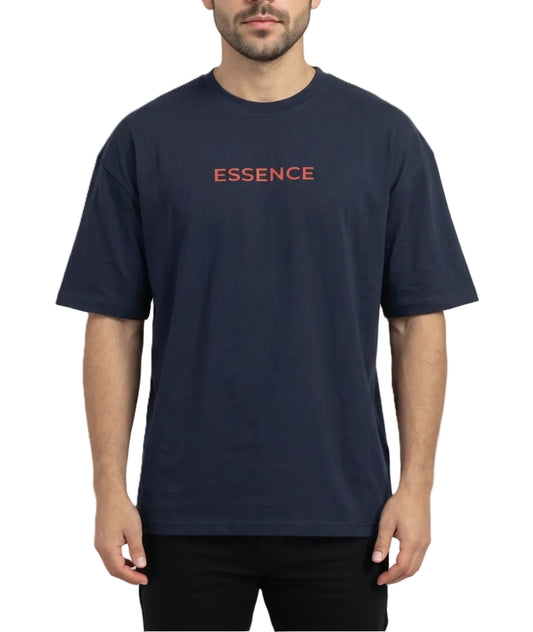 A man wearing a navy blue short-sleeve t-shirt with the word 'ESSENCE' printed in red across the chest, shown against a plain white background.