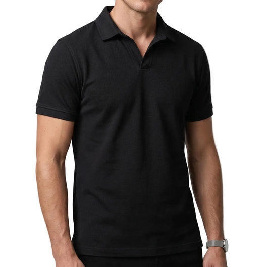 Front view of a model wearing a men's black 100% cotton polo t-shirt by TREE.