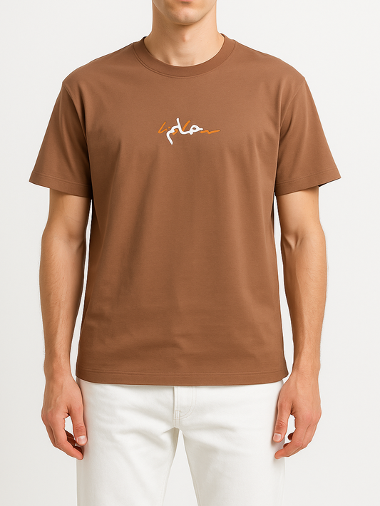 Person wearing a brown t-shirt with a logo on a white background