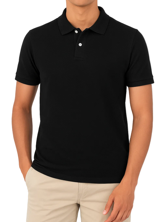 Flat-lay view of a men’s black solid piqué polo shirt with a regular fit by TREE