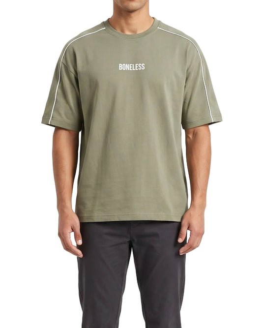 A male model wearing a men's oversized olive green t-shirt featuring a white BONELESS print on the chest and white shoulder piping.