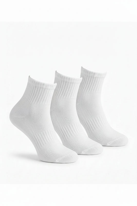 View of kids' white cotton half-socket socks in a clean white shade by TREE.
