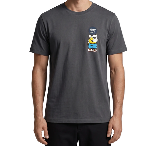 Person wearing a gray t-shirt with a cartoon character on a plain background
