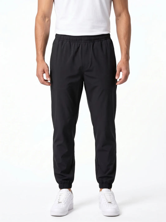 Men's soft athletic sweatpants in black color made of 100% polyester from TREE