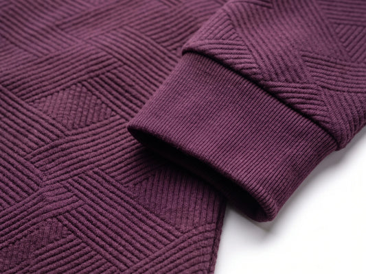 Close-up fabric and collar details of men's burgundy crewneck sweatshirt from TREE