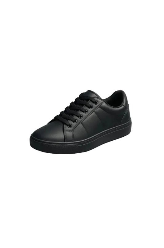 View of kids' all-black casual sneakers by TREE showing the anti-slip bottom sole and sleek upper design.