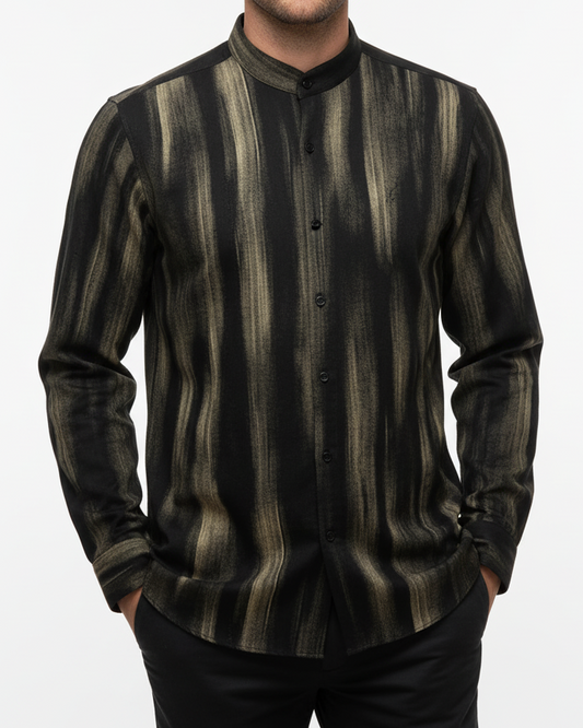 Black and brown striped shirt worn by a person on a white background