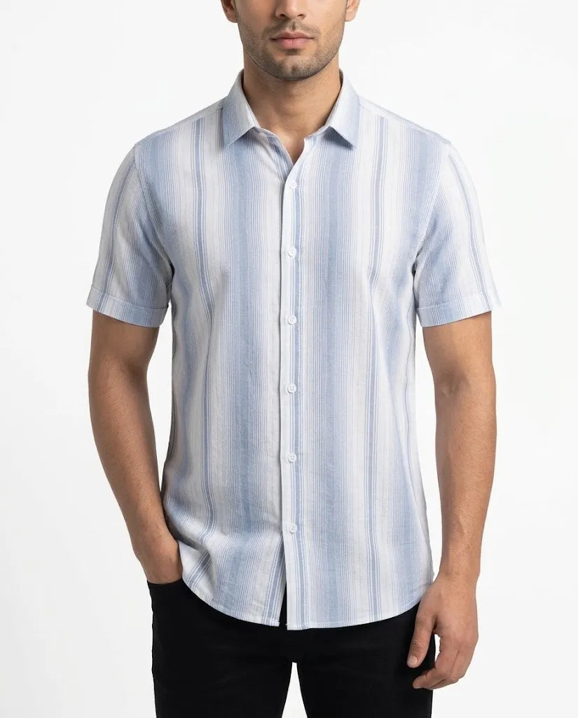 Close-up of the classic collar and button details on TREE's men's striped shirt