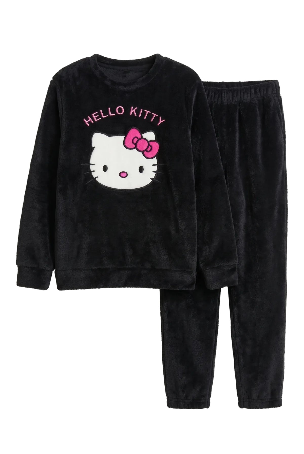 A two-piece kids' pajama set consisting of a black plush long-sleeve sweatshirt and matching pants. The sweatshirt features a large Hello Kitty face graphic with a pink bow and the words 'HELLO KITTY' in pink above it.