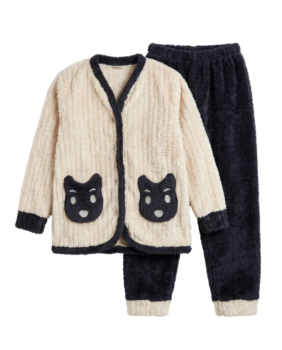 A two-piece children's pajama set featuring a cream ribbed sherpa cardigan with dark navy trim and cat-face patches, paired with matching dark navy plush pants, shown on a light beige background.