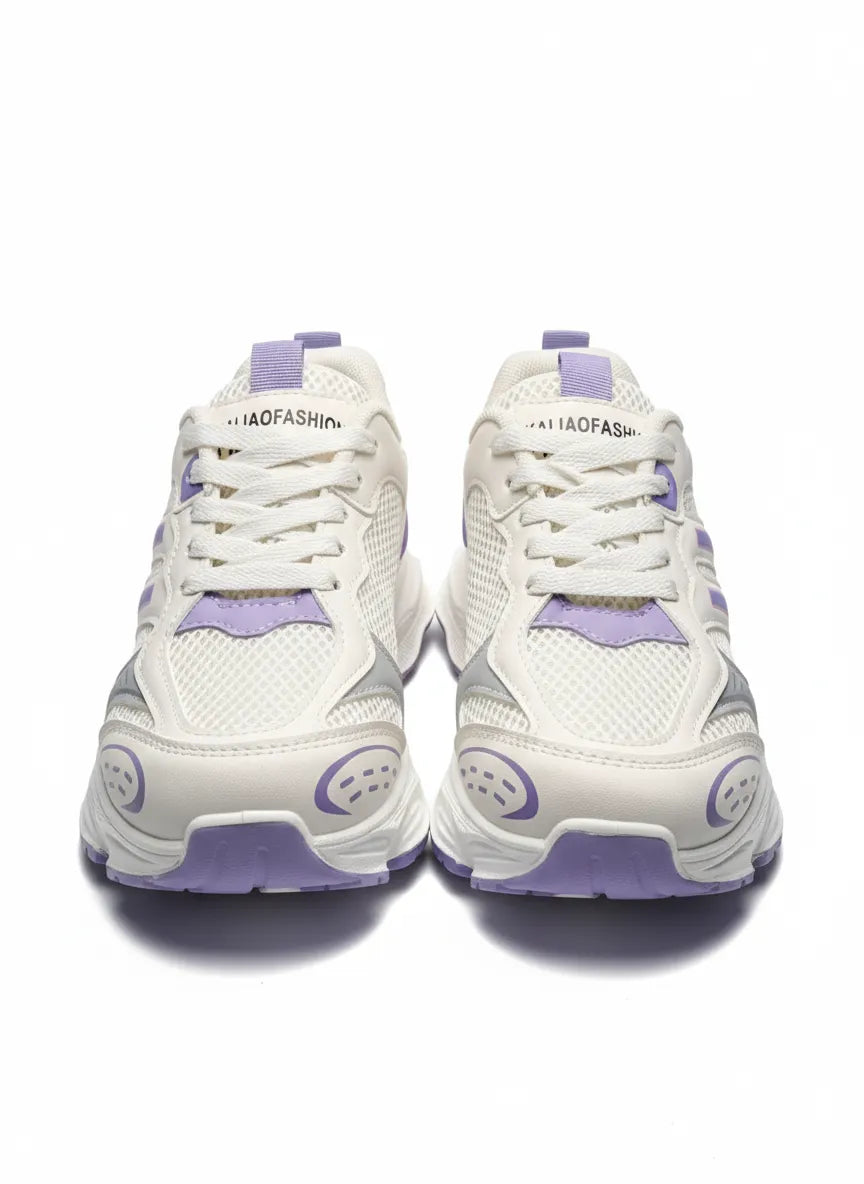 Multiple angle views of a girls' white and lavender fashion sneaker featuring a chunky sole and pull tab by TREE.