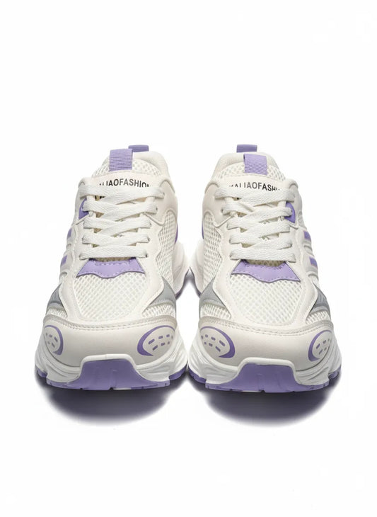 Multiple angle views of a girls' white and lavender fashion sneaker featuring a chunky sole and pull tab by TREE.