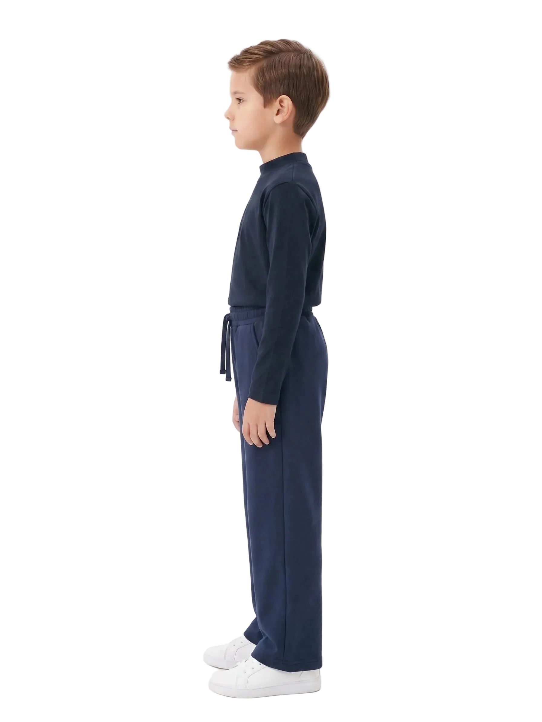 Front view of a young boy wearing a navy high-neck basic top by TREE.