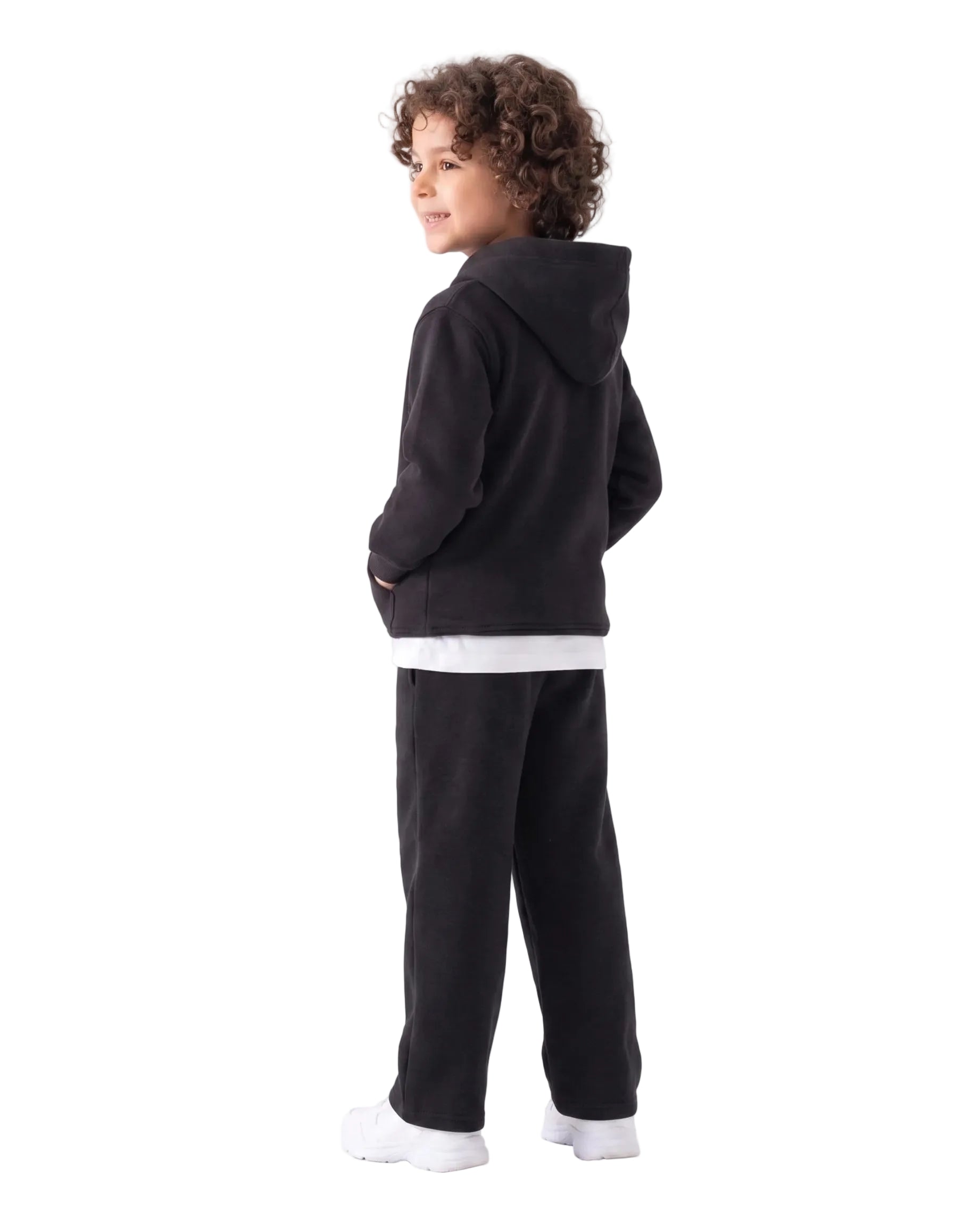 Front view of a young boy wearing a black milton hoodie by TREE.