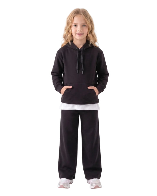 Front view of a young girl wearing a black milton hoodie by TREE.