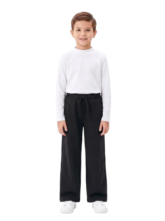 Young boy wearing a white long-sleeve high-neck basic from TREE