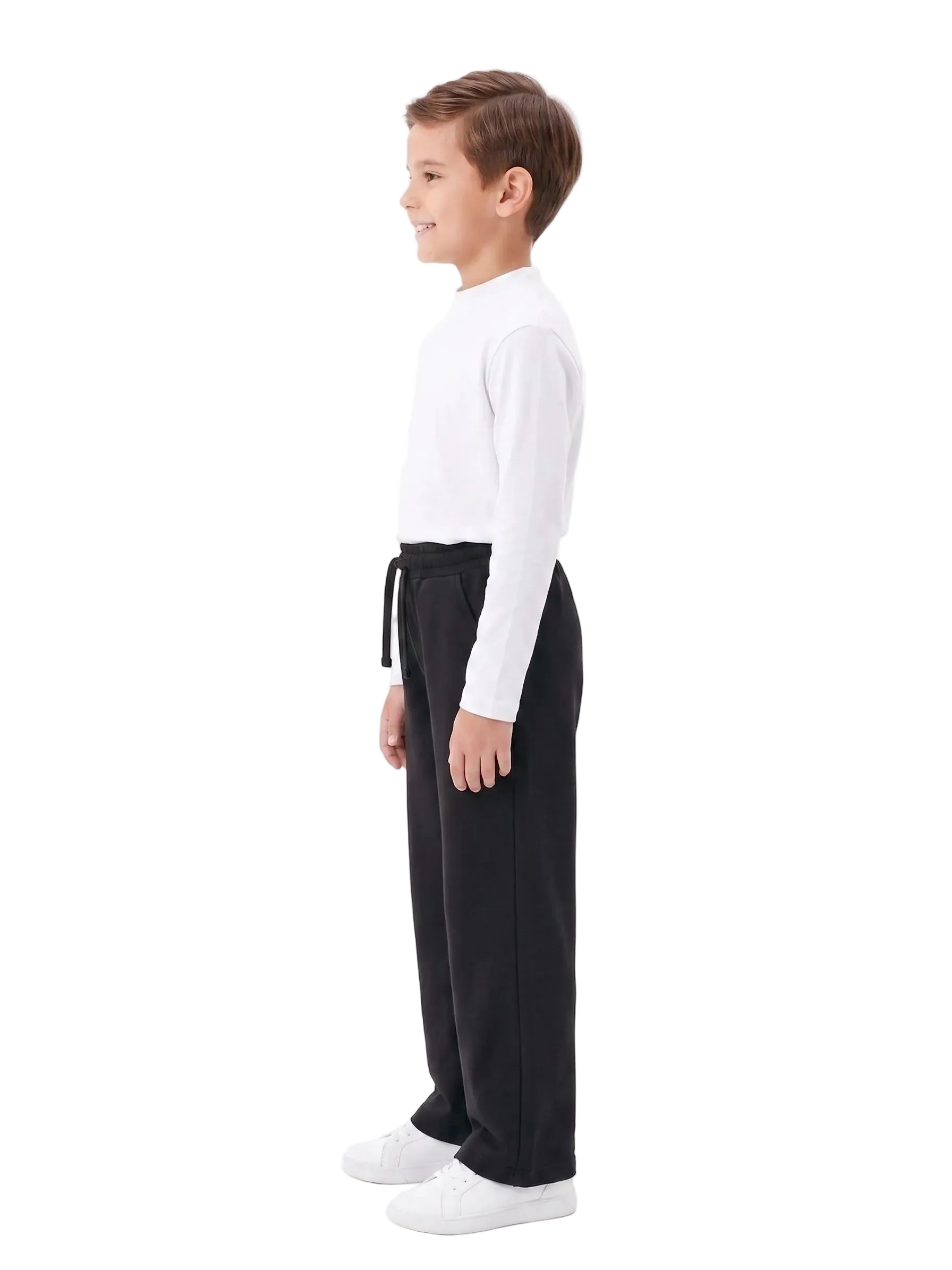Young boy wearing a white long-sleeve high-neck basic from TREE