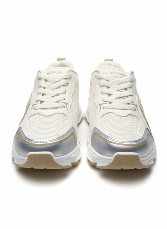 Multiple angle views of a kids' white and beige fashion sneaker featuring a chunky sole and pull tab by TREE.