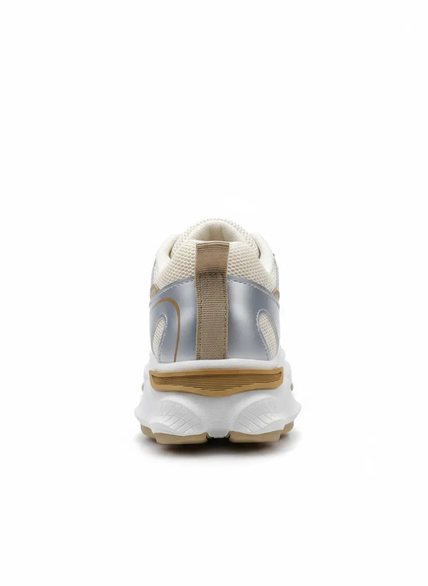 Multiple angle views of a kids' white and beige fashion sneaker featuring a chunky sole and pull tab by TREE.