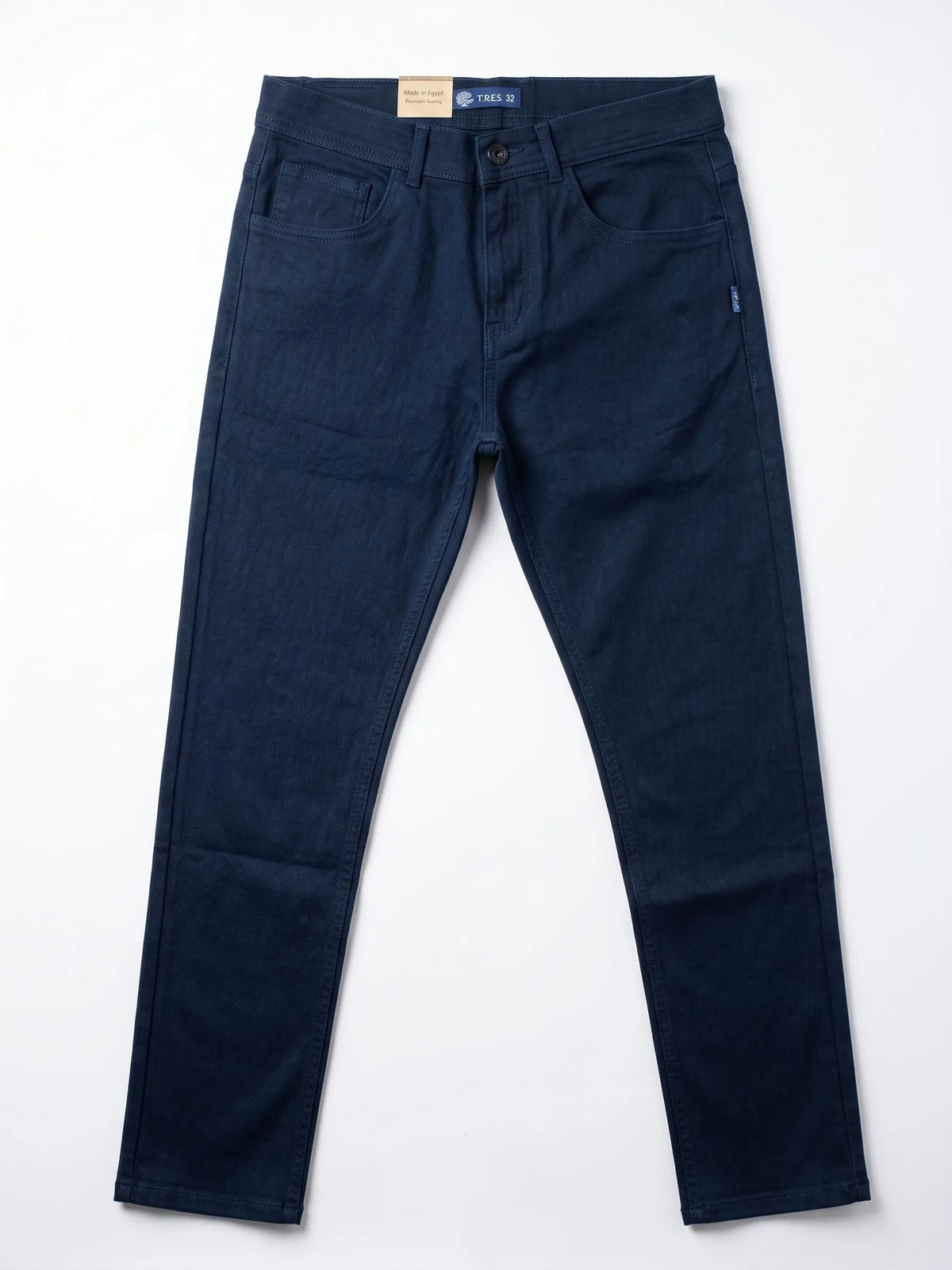 Studio shot of men's slim-fit 5-pocket gabardine pants in dark blue by TREE.