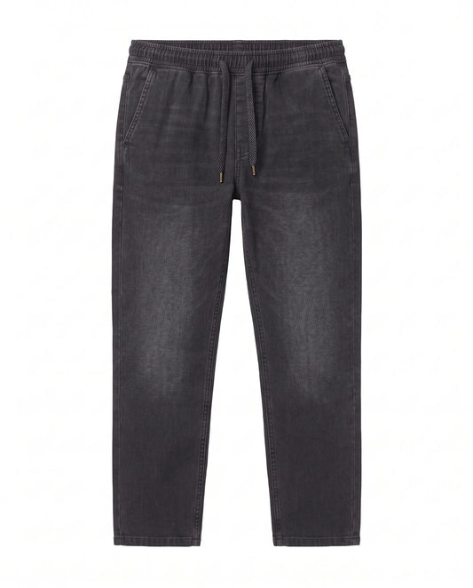 Men's black wide-leg jeans made of 99% cotton and 1% elastane with elastic waist by TREE   