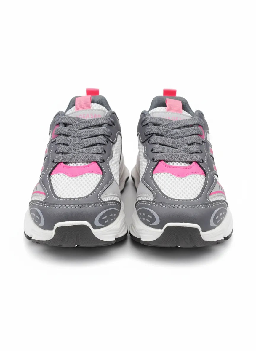 Multiple angle views of a kids' grey and fuchsia fashion sneaker featuring a chunky sole and pull tab by TREE.