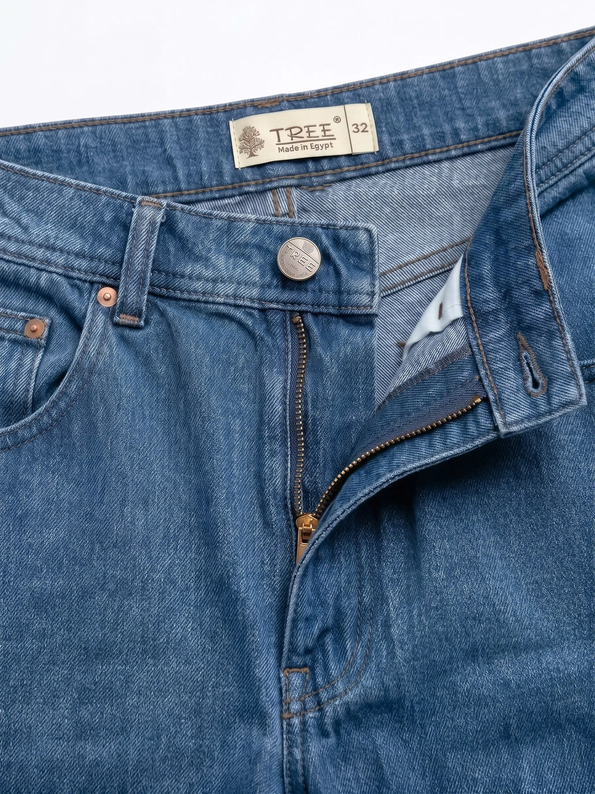 Men's blue wide-leg jeans with fixed waist and button closure by TREE   