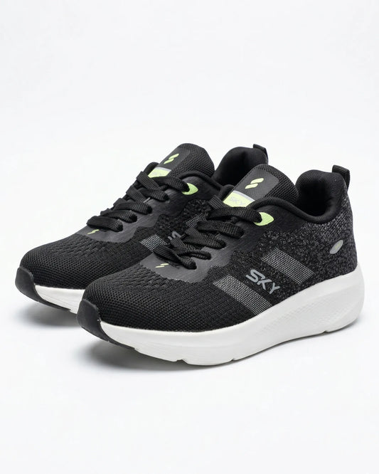 Front view of a kids' black fashion sneaker featuring a chunky sole, SKY branding, and pull tab by TREE.