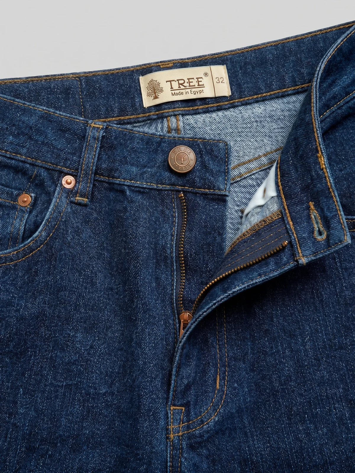 Men's dark blue straight fit jeans with fixed waist and button closure by TREE   
