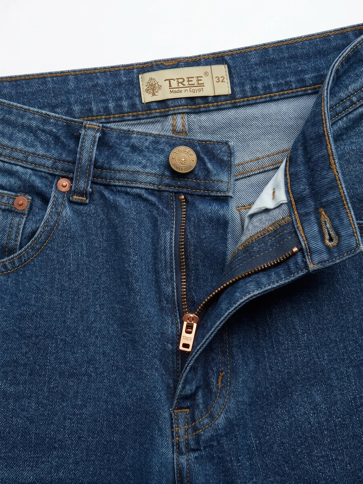 Men's blue straight fit jeans showcasing back pockets and fixed waistband by TREE