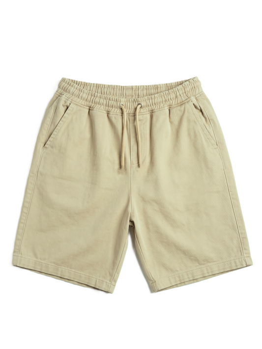 Beige drawstring shorts with an elastic waistband, displayed flat against a white background.