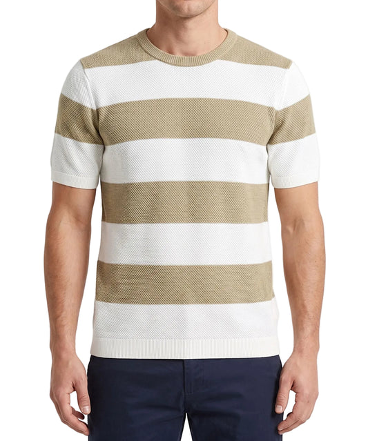 A man wearing a summer horizontal striped knit t-shirt with a textured finish and crew neck, paired with casual pants.
