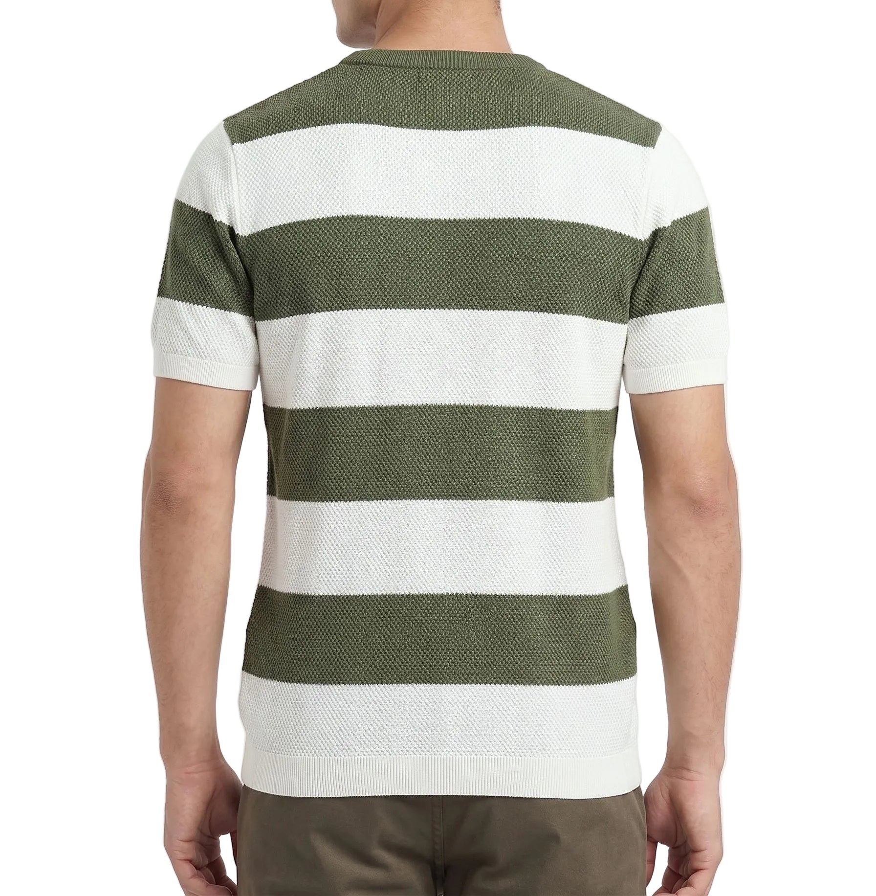 A man wearing a summer horizontal striped knit t-shirt with a textured finish and crew neck, paired with casual pants.