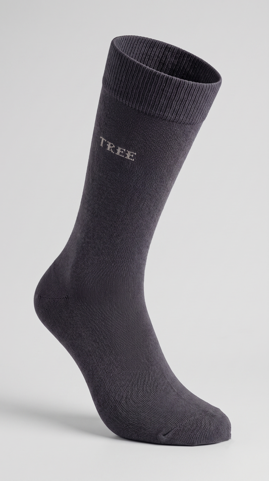 A single dark gray crew sock with the brand name 'TREE' printed in white on the side, displayed on a light gray background.