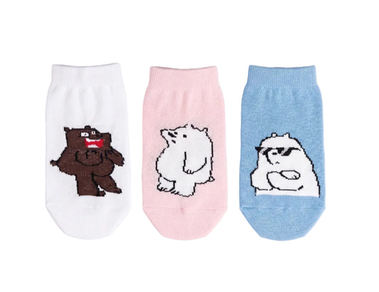 Flat lay view of a 3-pack kids' lycra socks set featuring cartoon bear prints by TREE.