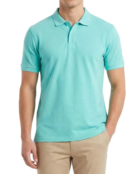 Front view of a man wearing a turquoise textured piqué premium polo shirt featuring a regular fit by TREE.
