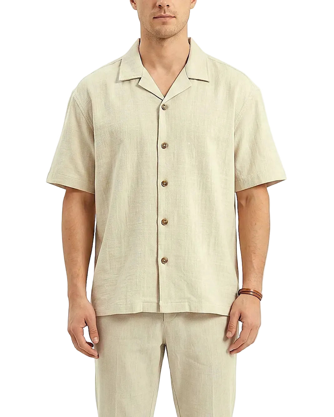 Front view of a men's solid beige casual shirt featuring a camp collar, short sleeves, and textured fabric in an oversized fit by TREE.