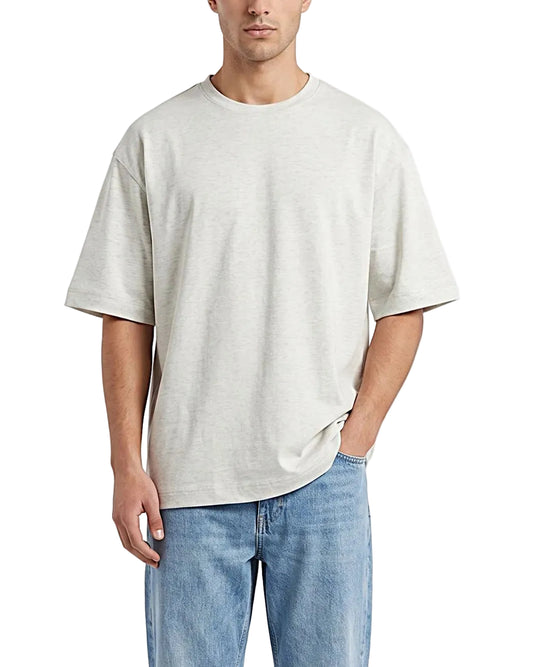Front view of a men's solid cotton blend casual t-shirt in an oversized fit by TREE.