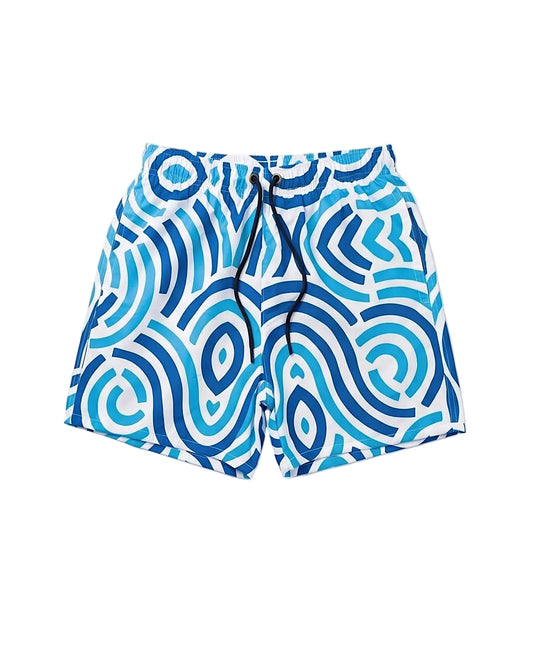 Front view of a kids' printed blue and white 100% polyester swim shorts in a relaxed fit by TREE.
