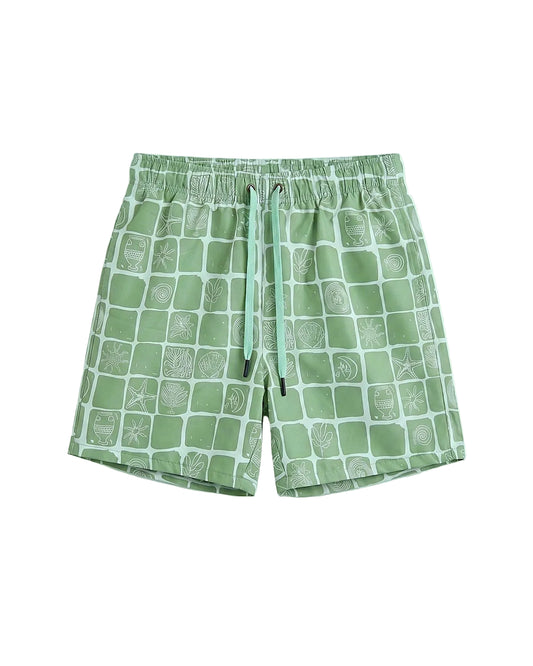 Front view of a kids' printed green 100% polyester swim shorts in a relaxed fit by TREE.
