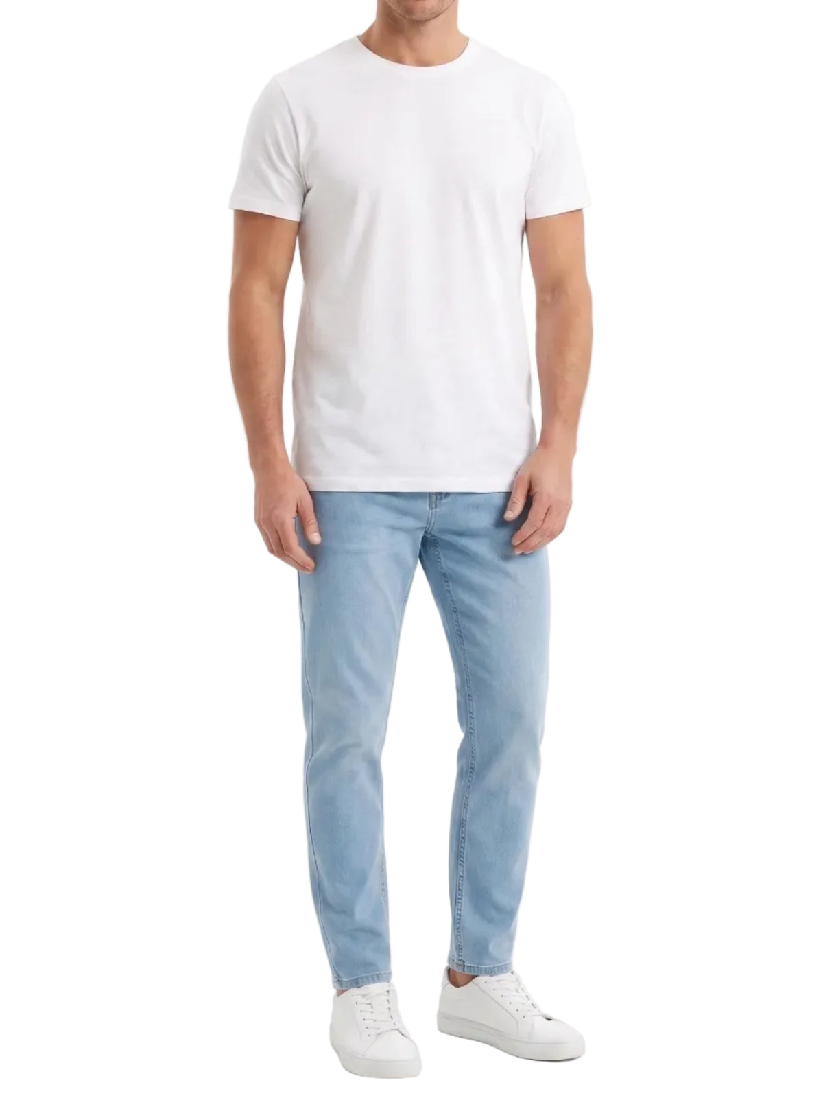 Front view of a man wearing light blue regular fit jeans by TREE.